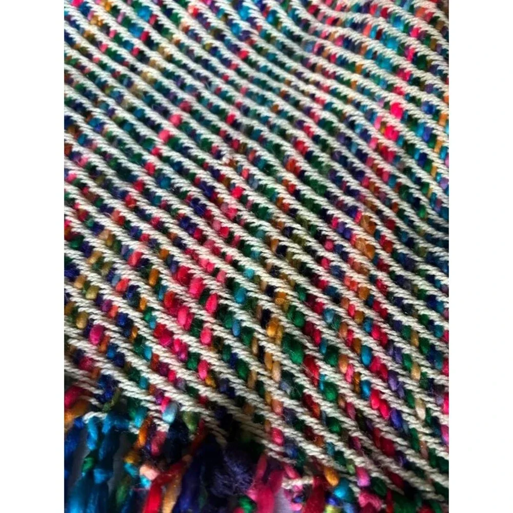 Colorful woven throw blanket with tassels/fringe